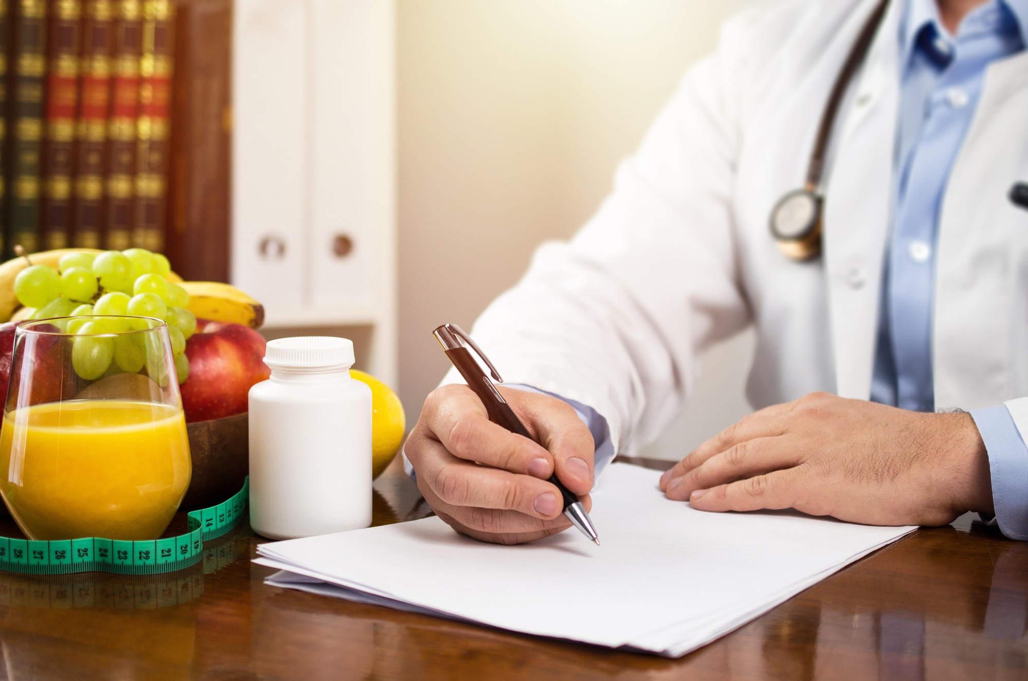 Nutritionist writing diet plan, dietician consultation
